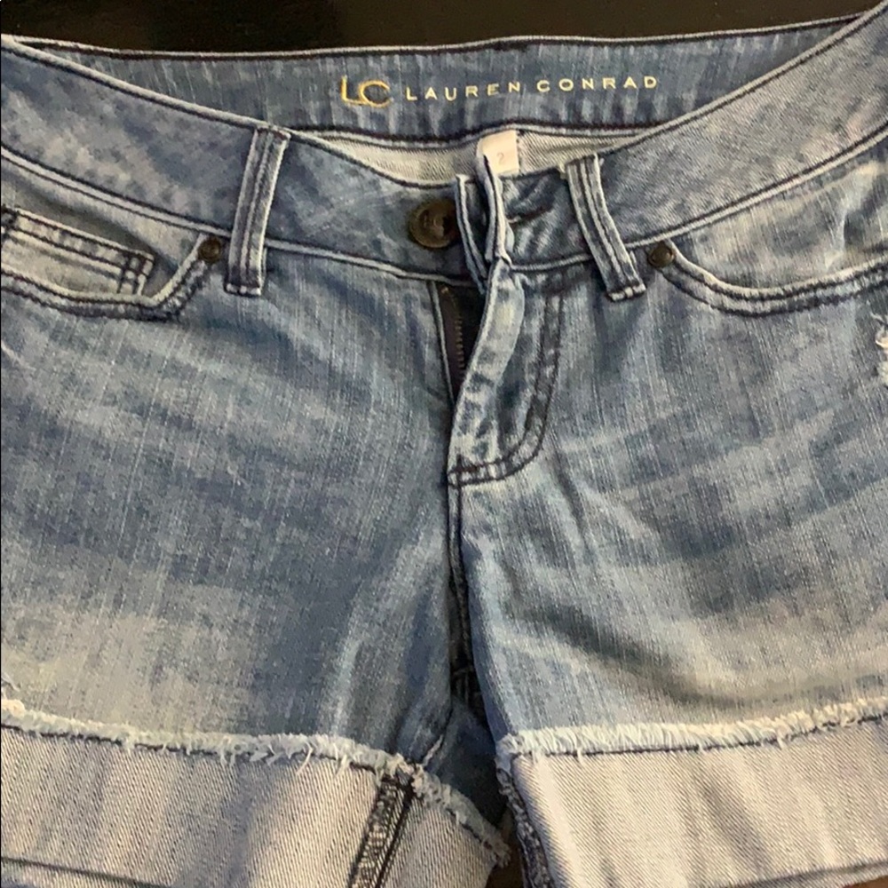 Lauren Conrad distresses shorts